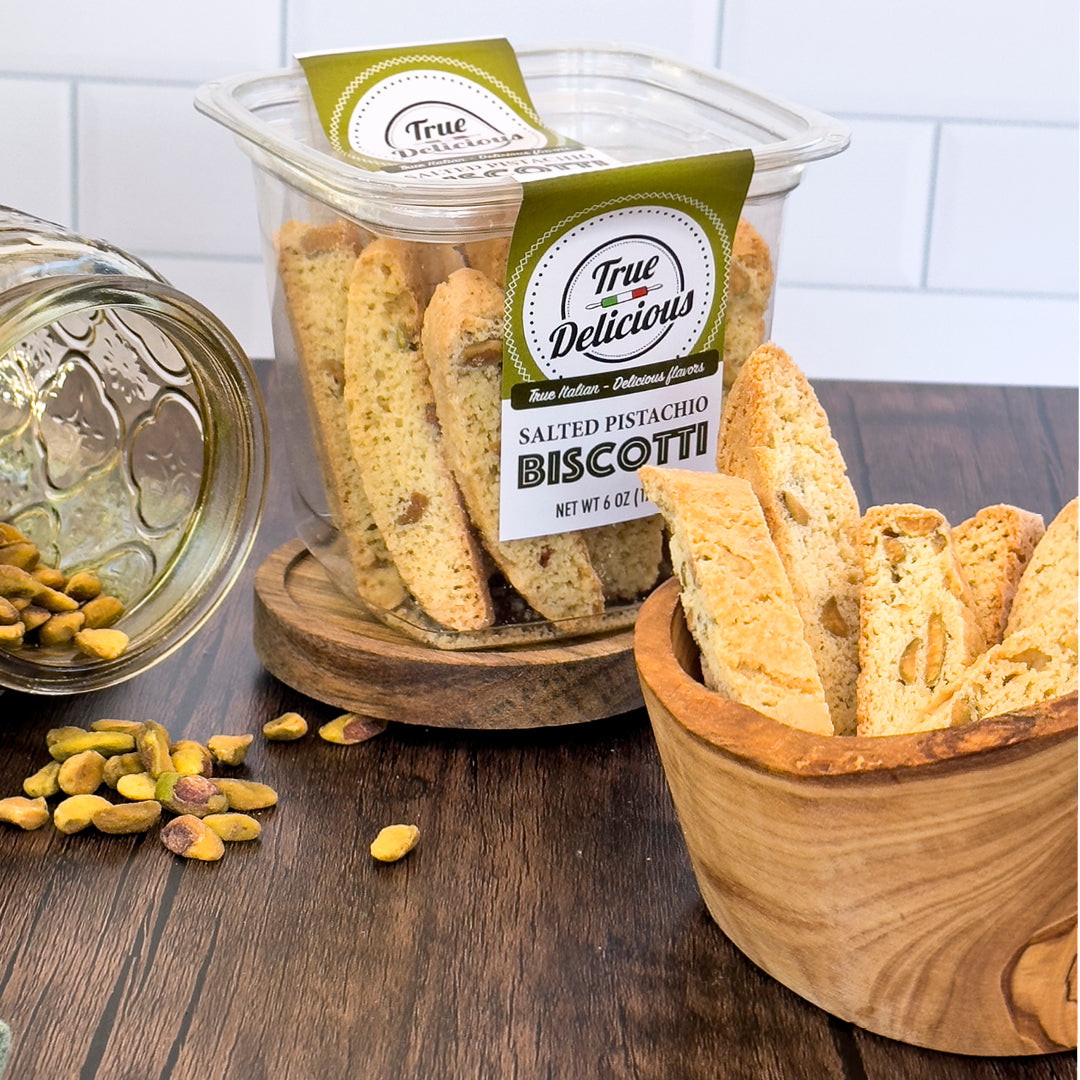 biscotti pairings for every occasion featuring salted pistachio biscotti in a jar and wooden bowl