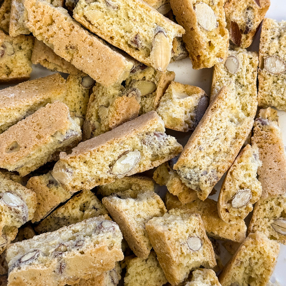 True Delicious Biscotti’s Biscotti Bits - Only Almond 2lbs showcase golden-brown, crunchy texture with visible almonds—perfect for savoring classic whole almond biscotti flavor in every bite.